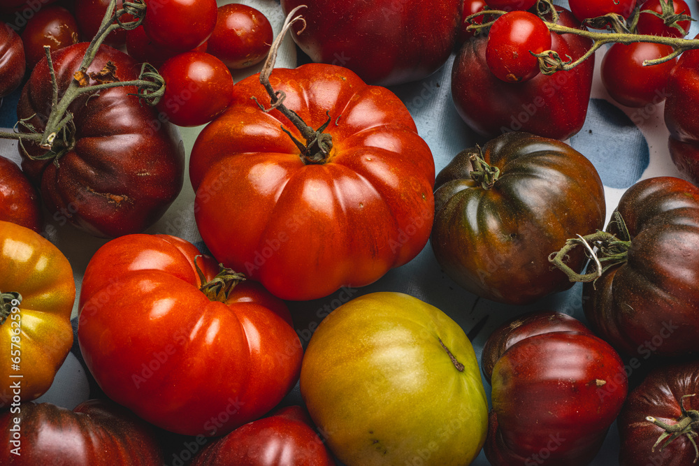 Ripe red tomatoes on a table. Ripe red tomatoes on a table.