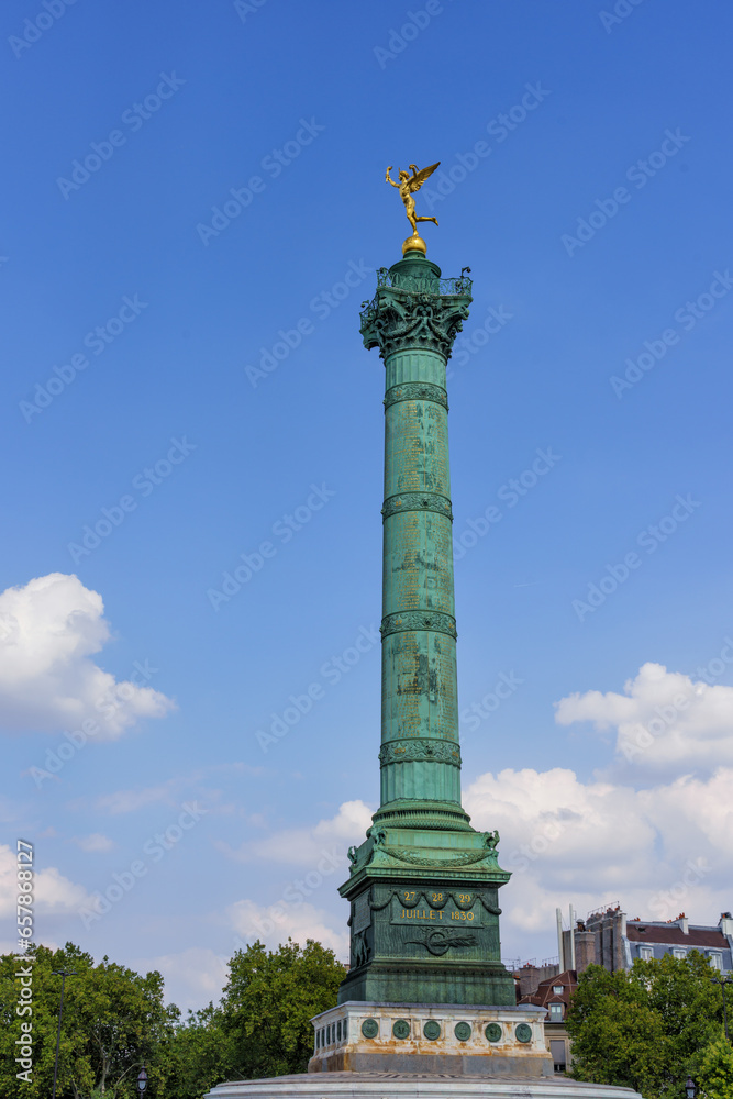 The July Column on the Place de la Bastille in Paris, France. Column with statue of the golden angel.