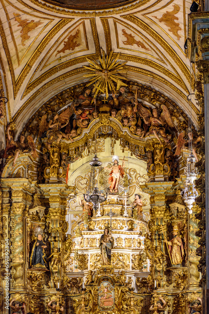 Old altar of a historic baroque church completely covered in gold in Ouro Preto, Minas Gerais