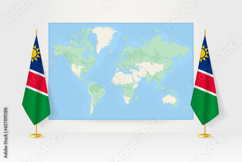 World Map between two hanging flags of Namibia flag stand.