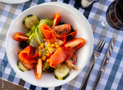 Salad with smoked salmon, prawns, vegetables and corn, nobody
