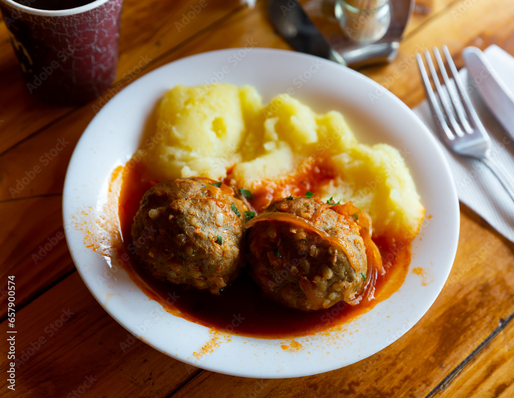 Ukrainian dish meatballs with mashed potatoes and gravy Stock Photo