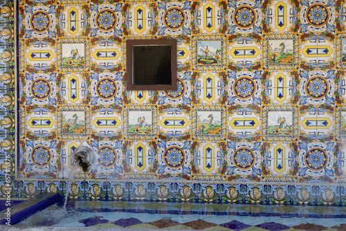 mosaic wall with water fountain