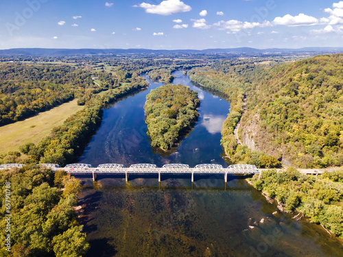 Landscape overlooking the forest and the Potomac River with a bridge on the border of the states of Maryland and Virginia. aerial photo photo