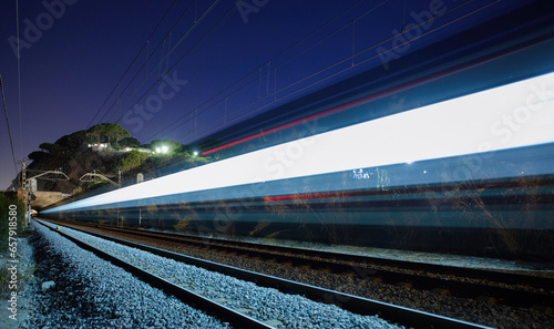 Magnificent view of fast train against starry sky