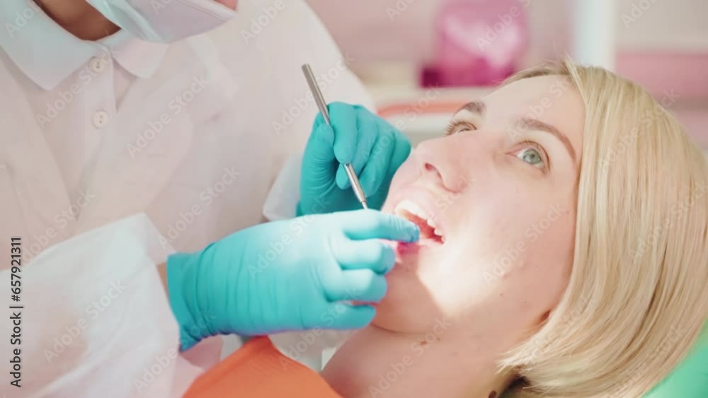 Woman on checkup appointment of her teeth in stomatology clinic. Woman on checkup appointment of her teeth in stomatology clinic.