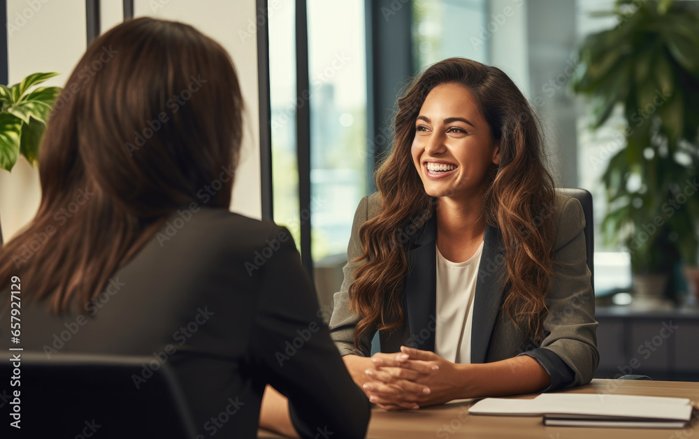 A woman being interviewed in a modern office. Generative AI A woman being interviewed in a modern office. Generative AI