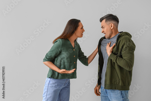 Young couple quarreling on ...