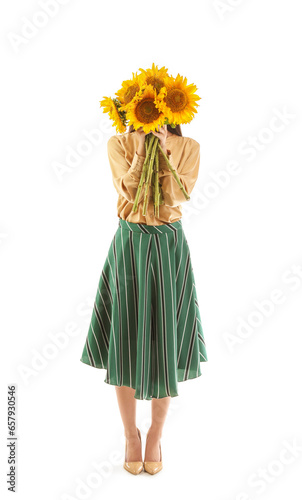 Young woman with bouquet of...