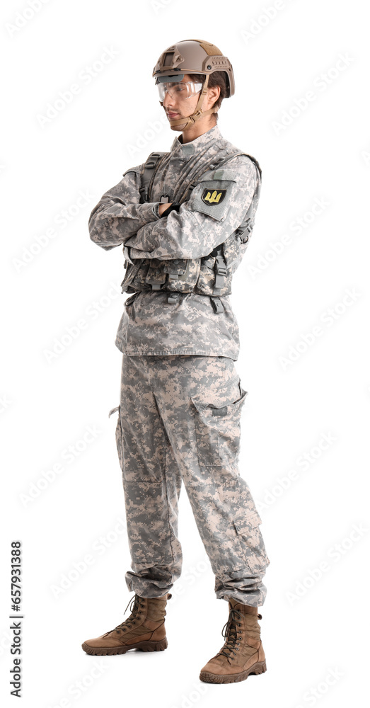 Young male soldier in full gear isolated on white background Young male soldier in full gear isolated on white background