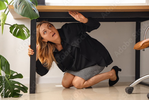 Scared mature businesswoman...