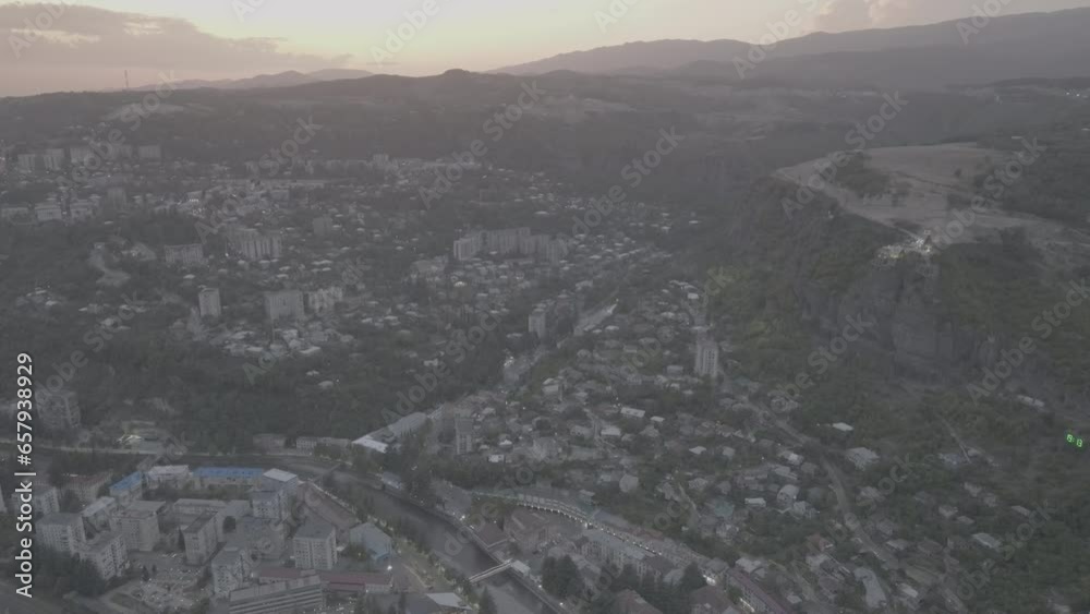 Aerial view of the Chiatura miners city in Imereti province, Georgia. Drone footage of the Chiatura cityscape in summer. Ungraded D-Log Aerial view of the Chiatura miners city in Imereti province, Georgia. Drone footage of the Chiatura cityscape in summer. Ungraded D-Log