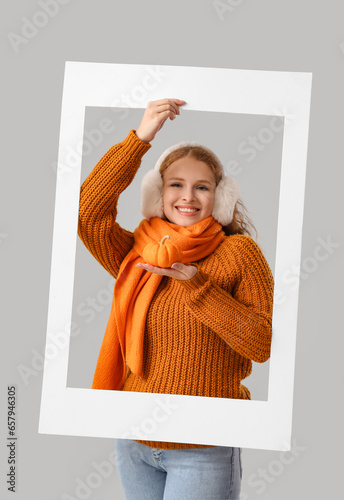 Young woman with pumpkin an...