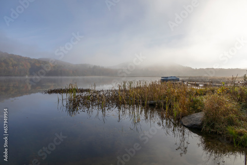 The morning mist over Cranberry Lake in Haliburton, Ontario starts to subside.