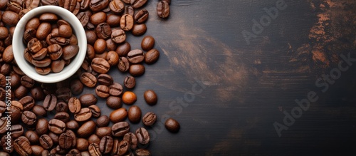 Coffee in paper cups with beans on white table background top view