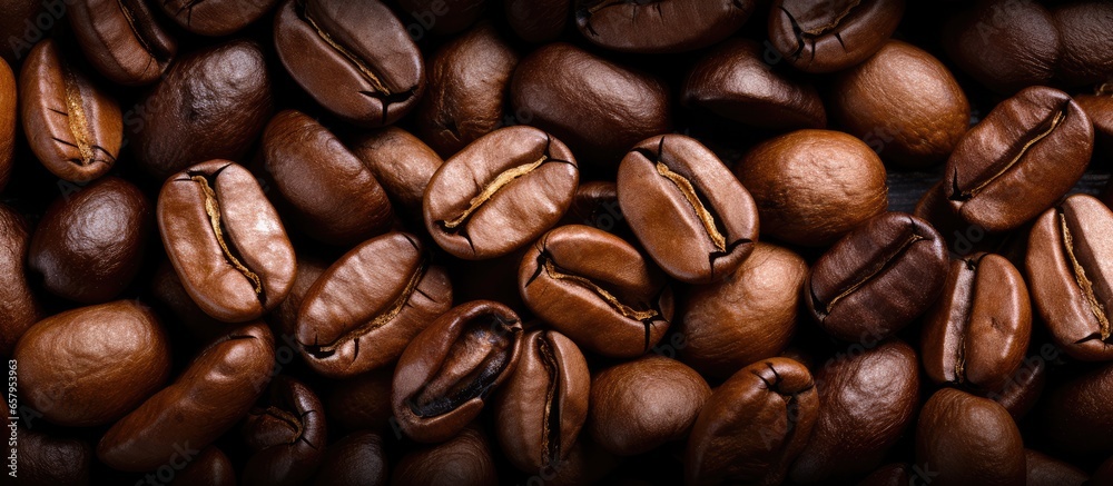 Fototapeta premium Close up image of roasted coffee beans texture