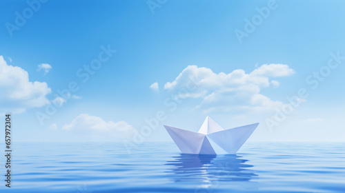 A white paper ship floating in the sea against a blue sky.