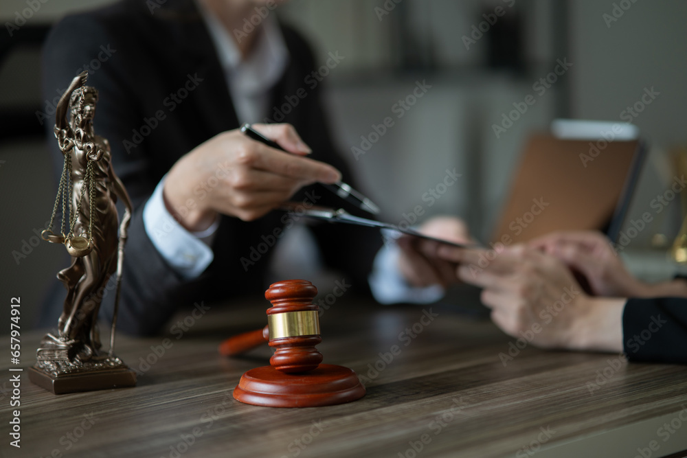 Judge gavel with Justice lawyers having team Concepts of Law and Legal services Judge gavel with Justice lawyers having team Concepts of Law and Legal services