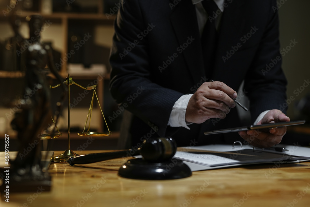 Male lawyer or judge consult having team meeting with client, Law and Legal services concept.. Male lawyer or judge consult having team meeting with client, Law and Legal services concept..