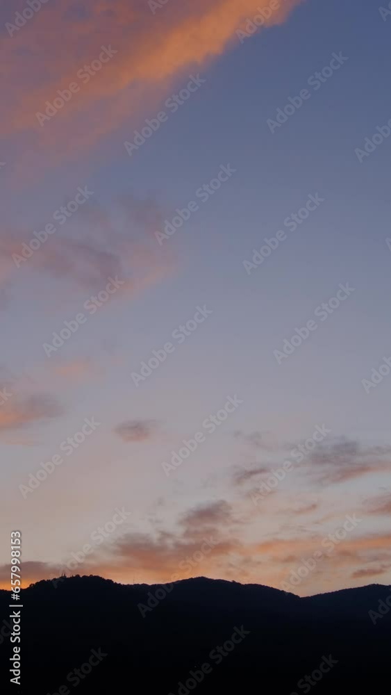 Twilight and dawn sky with cumulus cloud vertical time lapse in an evening. Twilight and dawn sky with cumulus cloud vertical time lapse in an evening.