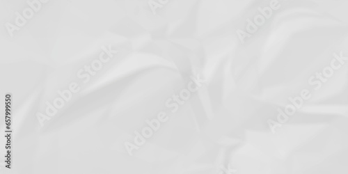Crumpled wrinkled white paper texture. White crumpled paper texture crush paper so that it becomes creased and wrinkled. Old white crumpled paper sheet background texture.	