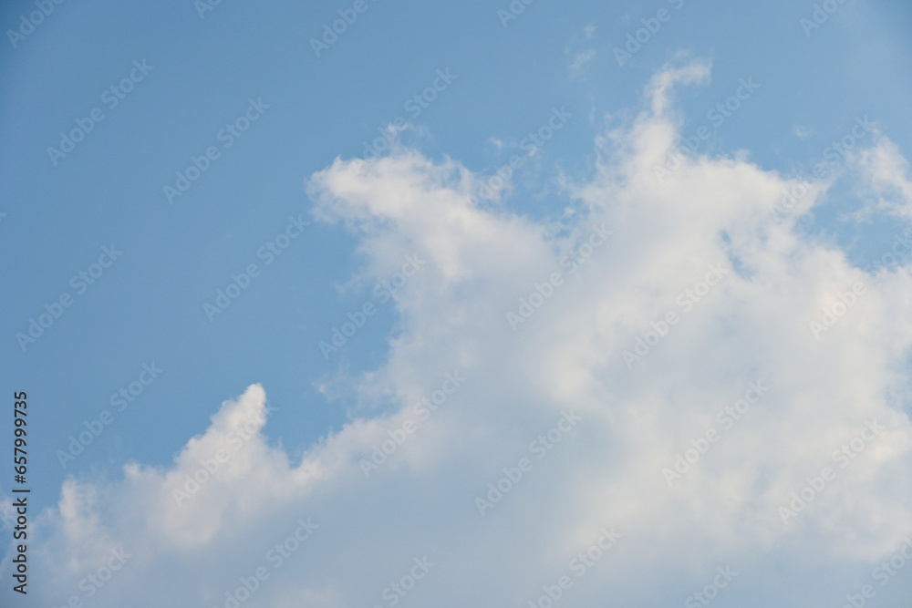 beautiful blue sky and white fluffy cloud with sunrise in the morning, natural background beautiful blue sky and white fluffy cloud with sunrise in the morning, natural background