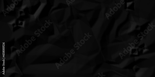Crumpled black paper texture. Black crumpled paper texture crush paper. creased and wrinkled. Old dark black crumpled paper sheet background texture.	
