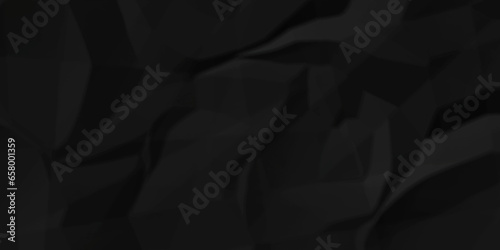 Crumpled paper texture. black crumpled paper texture. top view. crush paper so that it becomes creased and wrinkled. Old black crumpled paper sheet background texture.