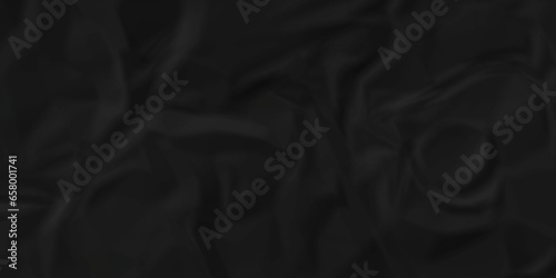 Crumpled black paper texture. Black crumpled paper texture crush paper. creased and wrinkled. Old dark black crumpled paper sheet background texture.	