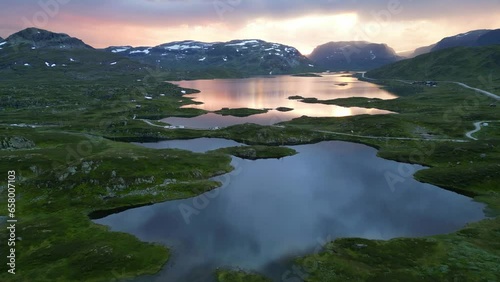 Sunset Nature Landscape in Norway - Stavatn Lake and Snow Covered Mountains Peaks - Vestland, Vestfold og Telemark - Aerial photo