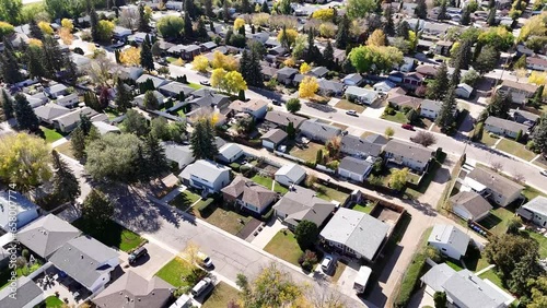 Elevate your view over Adelaide Churchill, a historic neighborhood in Saskatoon, Saskatchewan. This aerial drone footage unveils tree-lined streets, character homes, and communal parks