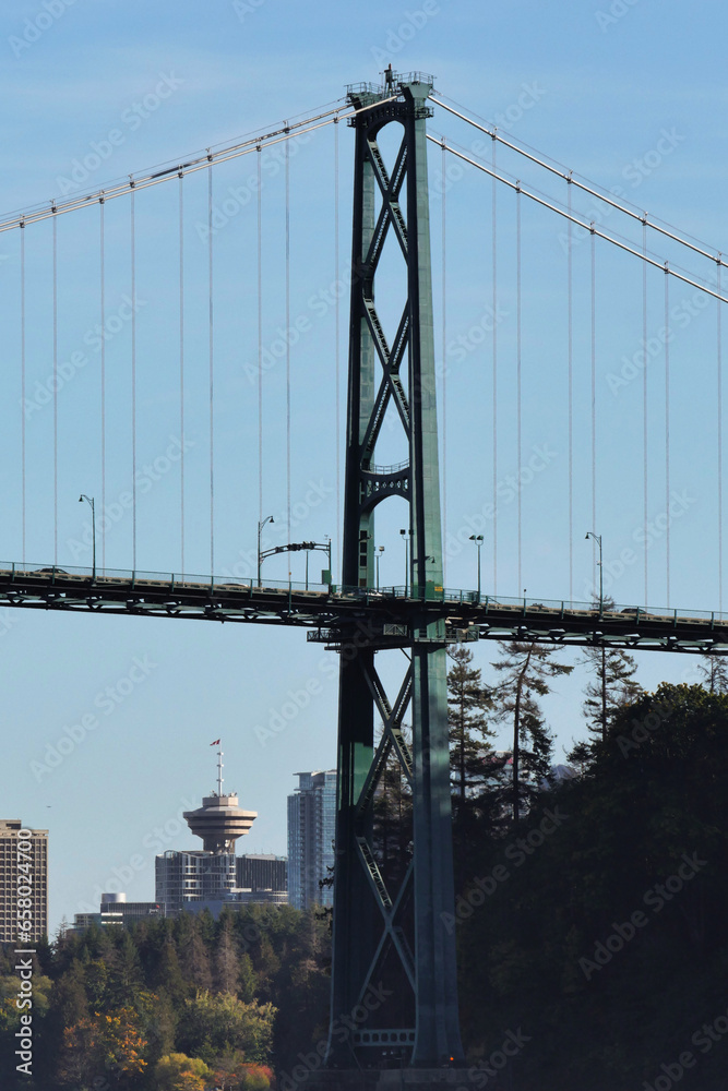 Fototapeta premium Lions Gate Bridge leading to Stanley Park as seen from Ambleside Park in West Vancouver, British Columbia, Canada