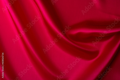 Close up of dark red silk background