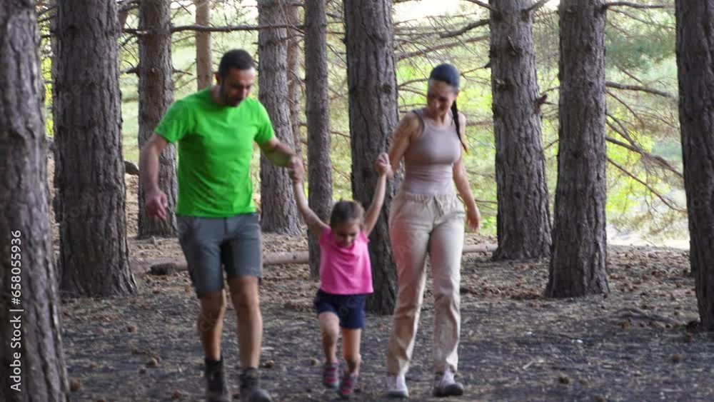 Joyful Family Run in the Woods - A lively trio in summer sportswear runs hand-in-hand, delighting in their shared forest adventure. Joyful Family Run in the Woods - A lively trio in summer sportswear runs hand-in-hand, delighting in their shared forest adventure.