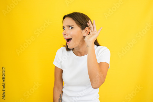 Woman Hearing Listening to a Secret and Paying Attention Copy Space