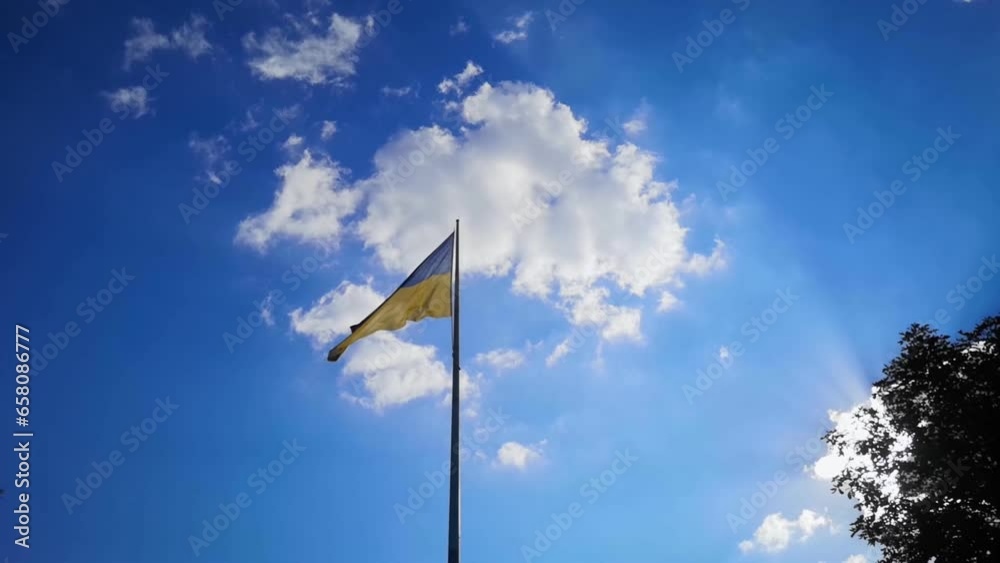 Flag Of Ukraine Against The Backdrop Of A Bright Sky And Shimmer Of The