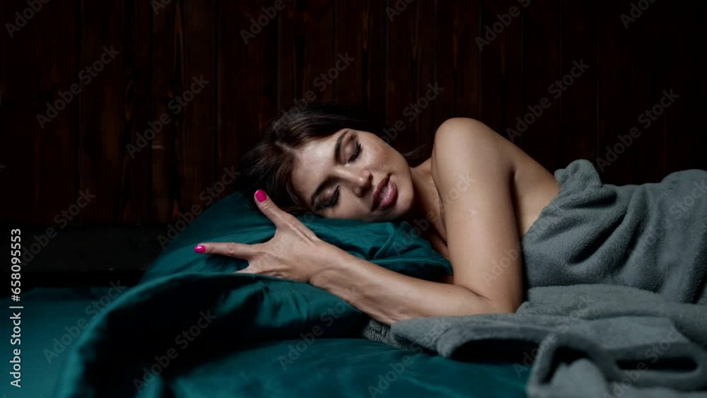 beautiful woman wakes up in a resort hotel bed enjoying a vacation in paradise beautiful woman wakes up in a resort hotel bed enjoying a vacation in paradise
