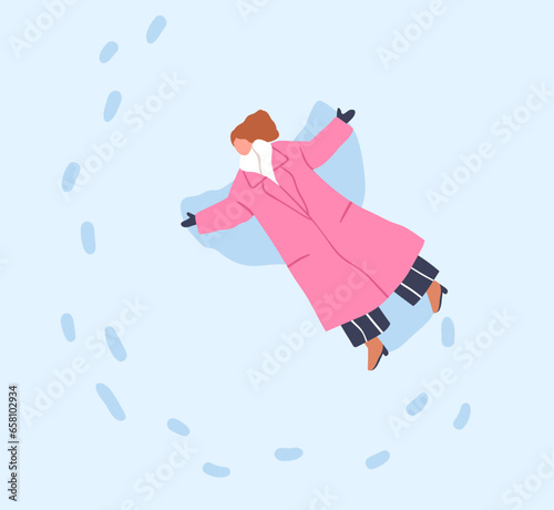 Woman making snow angel on winter holiday. Girl in coat, lying in snowdrift, ...