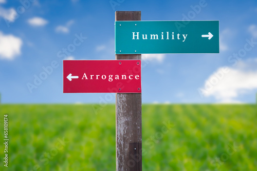Street Sign the Direction Way to Humility versus Arrogance. © Oleksandr