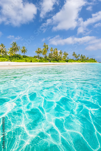 Fototapeta Naklejka Na Ścianę i Meble -  Amazing sunny panorama at Maldives. Luxury resort seascape. Majestic sea waves coconut palm trees sand sunshine sky. Beauty paradise beach popular destination. Best summer vacation travel background