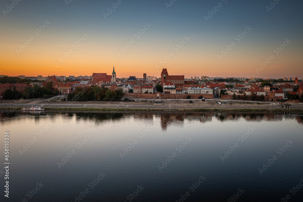 Wisla river by the Torun city at sunset, Poland.
