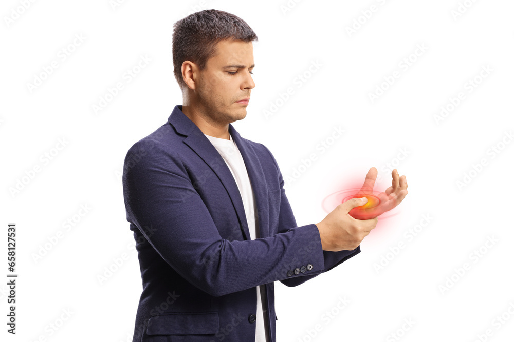 Young man suffering from arthritis and holding his red painful wrist Young man suffering from arthritis and holding his red painful wrist