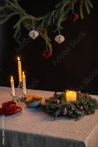 winter holidays and celebration concept - close up of christmas wreath, ginge...