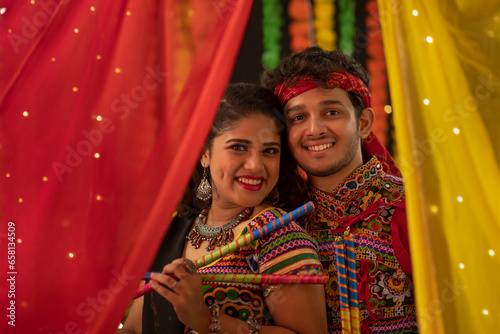Portrait of a gujarati couple dressed in a traditional Gujrati Attire, During the festival of Navratri