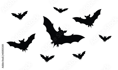 Vector silhouette of a flock of bats
