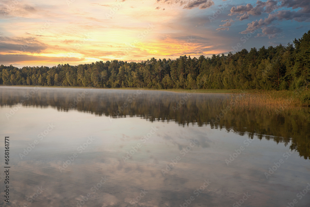Obraz premium View over sunrise White Lake. Rivne region, Ukraine.