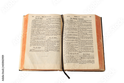 Open old holy bible book with German text in retro print isolated on white