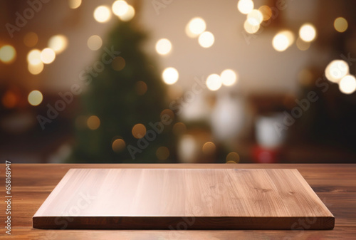 Wooden tabletop with cutting board and blurred background with Christmas tree and beautiful bokeh for displaying or mounting your products
