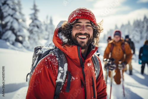 Portrait of a young man, a skier enjoying with friends winter sports photo