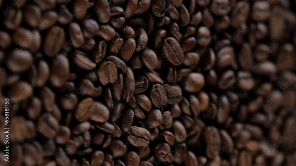 Dark roast coffee beans, rotation. Vertical video Dark roast coffee beans, rotation. Vertical video